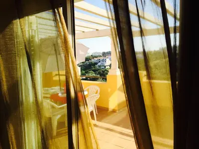 a view from a window of a balcony at Albufeira Luxury Villa in Albufeira