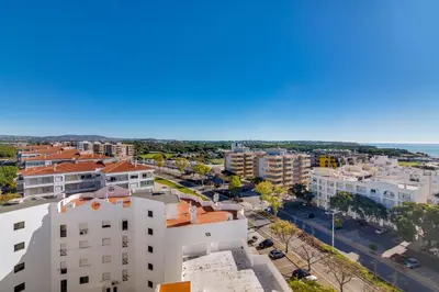 an aerial view of a city with buildings at Mar Azul 2 Bdr Apartment Quarteira in Quarteira