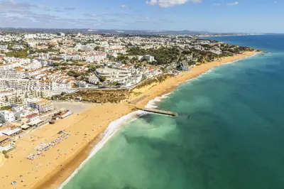 an aerial view of a beach and the ocean at Downtown Studio Apartment G - 150m from the Beach in Albufeira
