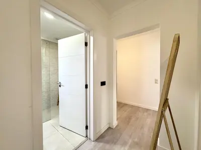 a bathroom with a door leading to a shower at Albufeira Amazing View With Pool by Homing in Albufeira