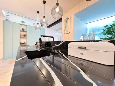 a kitchen with a counter top with a sink at Luxury Beach House - Casa do Farol by BeCherish in Albufeira