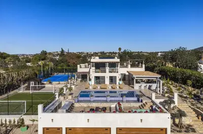 an aerial view of a house with a swimming pool at Villa Avalon - Bedzy Luxury in Almancil