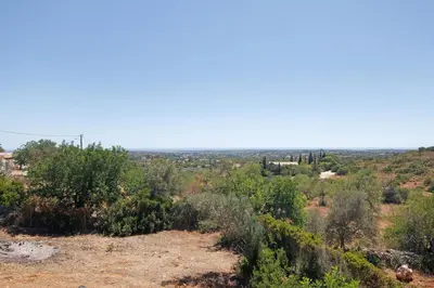 a view from the top of a hill with trees at Excelente Studio in Loulé