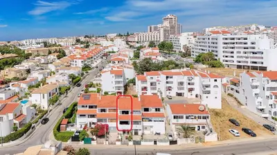 an aerial view of a city with white buildings at A Casa da Ana - By Algarkasa in Albufeira