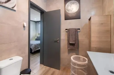 a bathroom with a sink and a shower at Mar à Vista in Albufeira