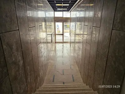 an empty hallway with stairs in a building at Blife Osonya - private rooms at Santantonya 4th floor in Faro