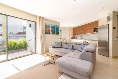 a balcony with a view of a city at São Luís Faro Apartment - Algarve in Faro