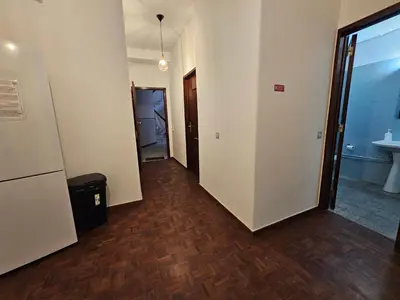 an empty hallway with a bathroom and a sink at Blife Tonya - private rooms at Santantonya 1st floor in Faro