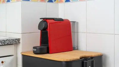 a red appliance sitting on top of a refrigerator at Cozy 1Bdr Flat w Pool in Vilamoura by Lovelystay in Quarteira