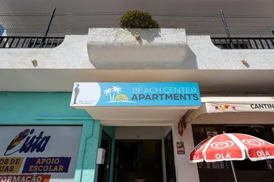 a building with a sign for a beach center apartments at Budget Beach Center B5 in Albufeira