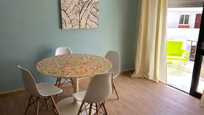 a dining room with a table and chairs at 150m to the beach at Sol a Sul apartments in Albufeira