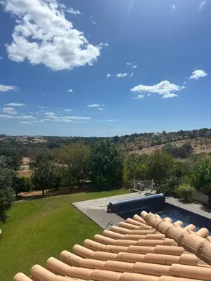 a view of a backyard with a swimming pool at Luxury home in Albufeira in Albufeira