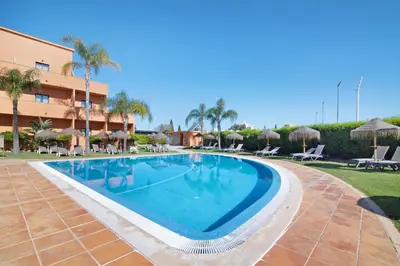 an image of a swimming pool at a resort at Apartamento 16 - Quarteira in Quarteira