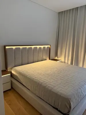 a bedroom with a large bed in a room at Quarteira Horizon Sea in Quarteira