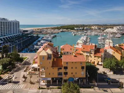a view of a harbor with boats in the water at Apartamento T1 Luxo Marina Vilamoura in Vilamoura