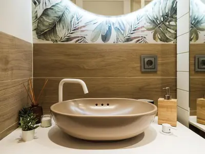 a bathroom with a large bowl sink on a counter at Apartamento T1 Luxo Marina Vilamoura in Vilamoura