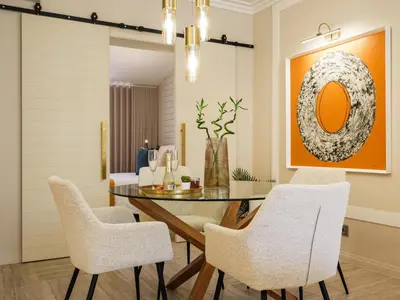 a dining room with a table and chairs at Apartamento T1 Luxo Marina Vilamoura in Vilamoura