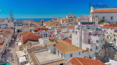 an aerial view of a city with buildings at Peneco Beach Apartment Old Town in Albufeira