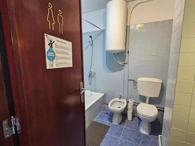 a bathroom with a toilet and a bidet at Blife Lusitanya - private rooms at Santantonya 1st floor in Faro