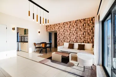 a living room with a couch and a table at Casa Gale Mar in Galé