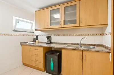 a balcony with a view of a city at T2 Apartment near the beach in Albufeira