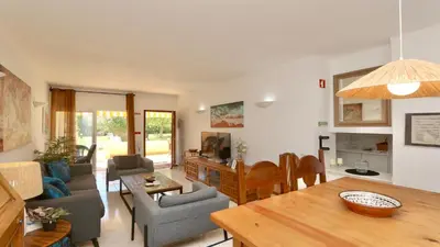 a living room with a couch and a table at Vilamoura Sul CD 312 - Cleverdetails in Quarteira