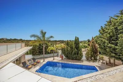 an aerial view of a swimming pool in a villa at Villa Caripira by Villa Plus in Albufeira