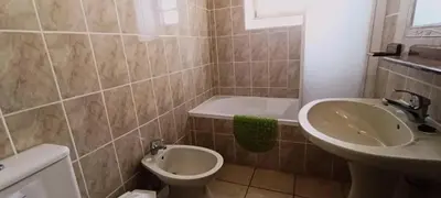 a bathroom with a toilet and a sink at Quinta do Lagar - 01 in Albufeira