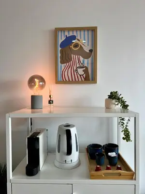 a white shelf with a coffee maker and a microwave at Ocean View Apartment Steps to Beach Vil15m Faro25m in Quarteira
