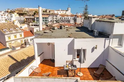 a view of a city from the roof of a building at Downtown Rooftop 1 Bedroom Apartment in Albufeira