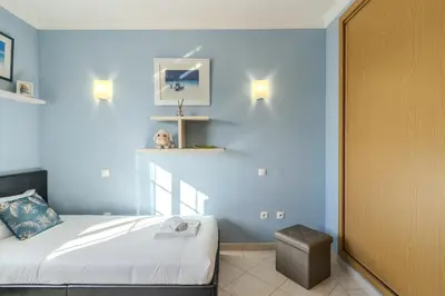 a bedroom with a desk and a mirror at #343 Villa with Pool & Jacuzzi by Home Holidays in Albufeira