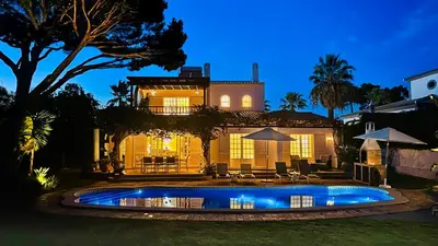 a house with a swimming pool in the yard at Villa Verde by Check-in Portugal in Vilamoura