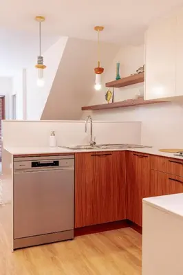 a kitchen counter with a coffee maker on it at Olhos de Água Beach Apartments by Mycelia in Olhos de Água