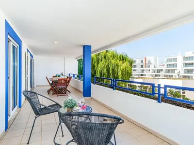 a balcony with a table and chairs on it at Apartment Mediterrâneo by Interhome in Vilamoura