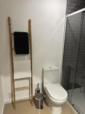 a bathroom with a toilet and a shower at Vale de Lobo - stylish beach and golf retreat in Almancil