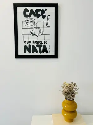 a white bed with yellow pillows on it at Casa Eliz Modern Comfort in the center of Faro in Faro