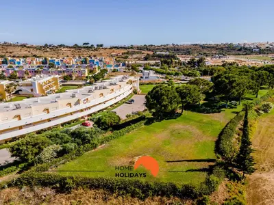 an aerial view of a city with buildings at #323 Jardins da Marina 2º BE by Home Holidays in Páteo