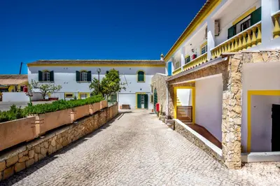 a street in a town with white buildings at Quinta do Moinho in Loulé
