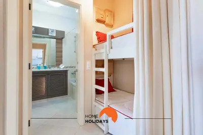 a room with a bunk bed with an open door at #121 T1 Aconchegante em Albufeira by Home Holidays in Albufeira