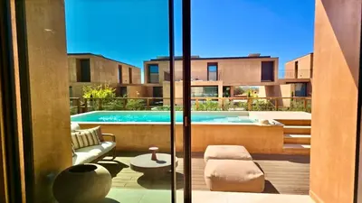 a view of a swimming pool from a house at Casa Centavo - Natura Village, CD 317 - Cleverdetails in Quarteira