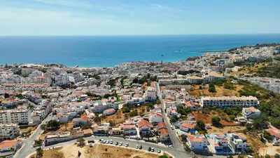 an aerial view of a city and the ocean at Vivenda Lemos A in Albufeira