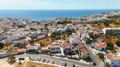 an aerial view of a city with the ocean at Vivenda Lemos C in Albufeira