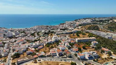 an aerial view of a city and the ocean at Vivenda Lemos D in Albufeira