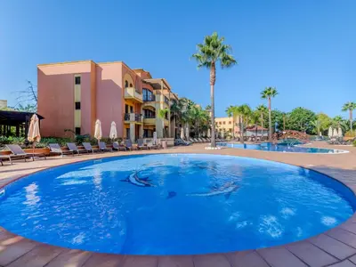 a gym with treadmills and elliptical machines at Apartment The Residence at Victoria by Interhome in Vilamoura