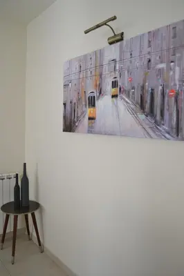 a painting of a subway train on a wall at Magnifique Villa à 10min de la mer in Faro