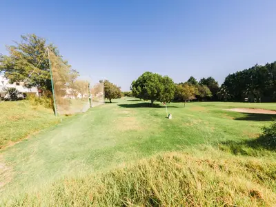 a view of the eighth green on the golf course at Apartment with 2 bedrooms in Balaia, Olhos de Água, Albufeira in Albufeira