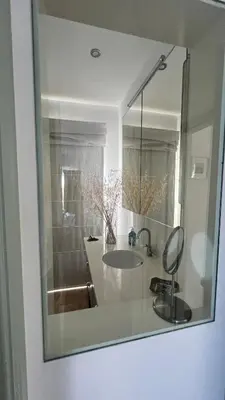 a bathroom with a sink and a mirror at The Lemon Tree House by IntiHolidays in Boliqueime