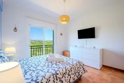 a balcony with a view of a building at Bragança Paradise in Albufeira