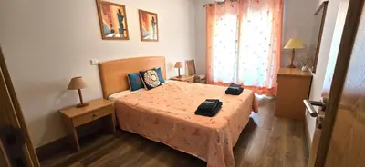 a small bedroom with a bed in a room at Ocean life in Albufeira