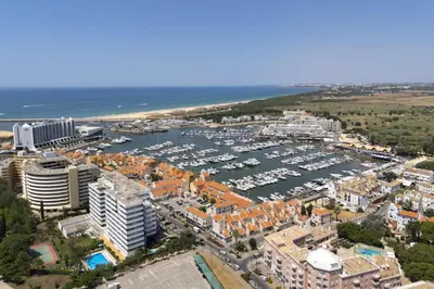 an aerial view of a harbor with a marina at Marina Praia - Marina view by HD in Vilamoura